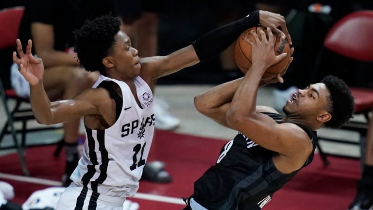 San Antonio Spurs' Joshua Primo blocks a shot attempt by Brooklyn Nets' Cam Thomas during the second half of an NBA summer league basketball game Sunday, Aug. 15, 2021, in Las Vegas. (John Locher/AP)