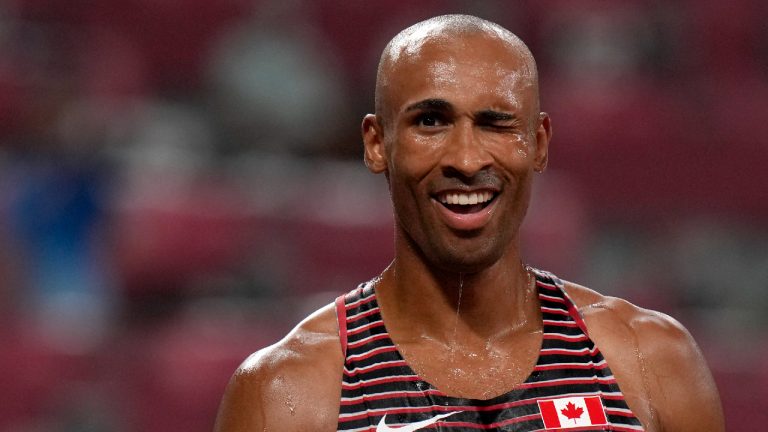 Damian Warner, of Canada smiles after winning the gold medal in the decathlon at the 2020 Summer Olympics, Thursday, Aug. 5, 2021, in Tokyo, Japan. (Francisco Seco/AP) 
