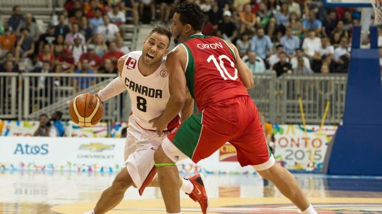 Canada's Carl English, left, seen here competing at the 2015 Pan Am Games, is returning to his root with a basketball academy built with his own hands in Newfoundland. (Chris Young/CP)