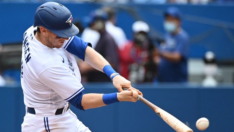 Toronto Blue Jays' Danny Jansen hits a double. (Jon Blacker/CP)