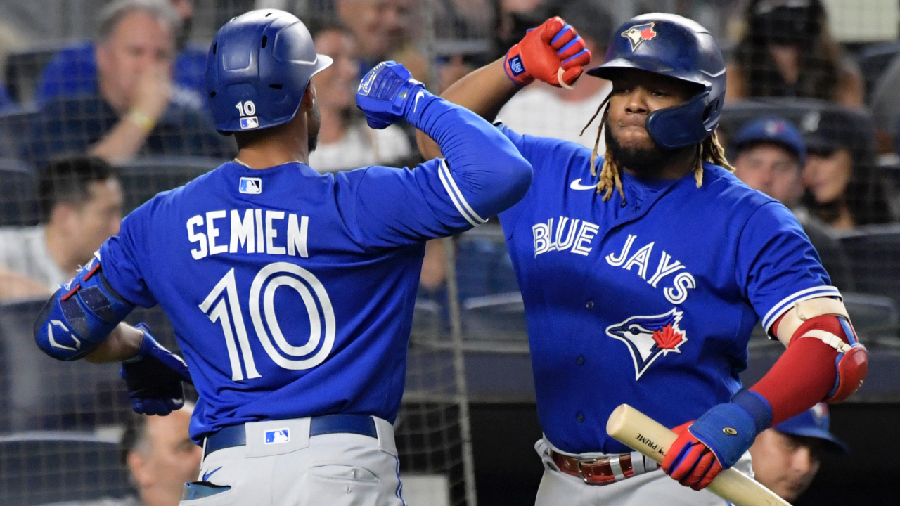 Blue Jays players Vladimir Guerrero Jr, Marcus Semien and Teoscar