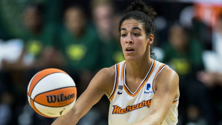 Phoenix Mercury guard Kia Nurse passes the ball. (Olivia Vanni/The Herald via AP)