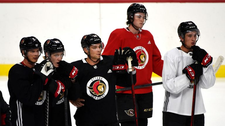 Ottawa Senators' Nick Holden (5), Lassi Thomson (60), Colby Williams (74), Zack Ostapchuk (38) and Cole Reinhardt (51) participates in the team's training camp. (Justin Tang/CP)