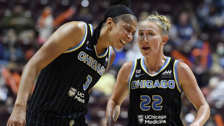 Chicago Sky point guard Courtney Vandersloot talks with forward Candace Parker. (Sean D. Elliot/The Day via AP)