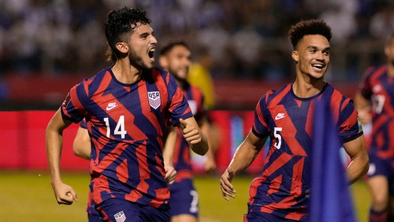 United States' Ricardo Pepi, left, celebrates scoring his side's second goal against Honduras during a qualifying soccer match for the FIFA World Cup Qatar 2022, in San Pedro Sula, Honduras, Wednesday, Sept. 8, 2021. (AP).