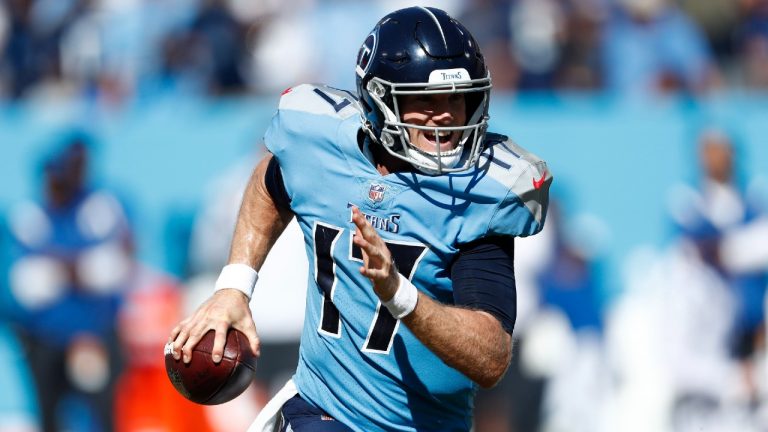 Tennessee Titans quarterback Ryan Tannehill scrambles against the Indianapolis Colts in the second half of an NFL football game Sunday, Sept. 26, 2021, in Nashville, Tenn. (Wade Payne/AP)