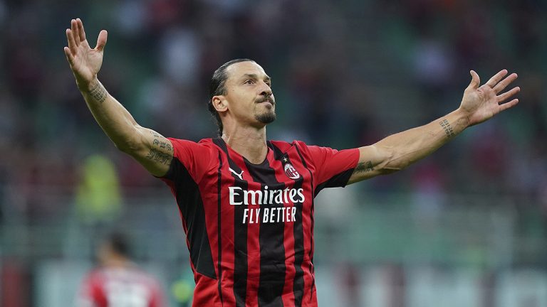 Milan's Zlatan Ibrahimovic celebrates after scoring  his side's seconf goal during the Italian Serie A soccer match between Milan and Lazio at the San Siro stadium in Milan, Italy, Sunday, Sept. 12, 2021. (Spada/LaPresse via AP)