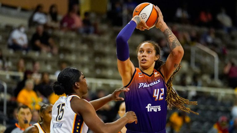 Phoenix Mercury centre Brittney Griner (42) shoots over Indiana Fever forward Teaira McCowan (15) in the first half of a WNBA basketball game. (Michael Conroy/AP) 