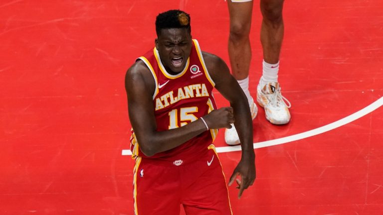 Atlanta Hawks center Clint Capela (15) reacts after a play against New York Knicks forward Julius Randle (30) during the second half in Game 3 of an NBA basketball first-round playoff series Friday, May 28, 2021, in Atlanta. (Brynn Anderson/AP)