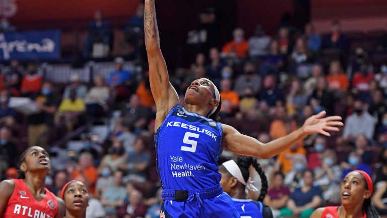 Connecticut Sun guard Jasmine Thomas scores against the Atlanta Dream in WNBA basketball action. (Sean D. Elliot/AP) 