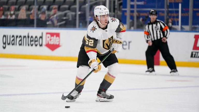 Vegas Golden Knights' Dylan Coghlan controls the puck during the third period of an NHL hockey game against the St. Louis Blues. (Jeff Roberson/AP) 