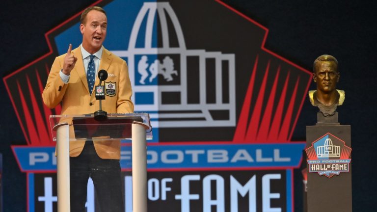 Peyton Manning, a member of the Pro Football Hall of Fame Class of 2021, speaks during the induction ceremony at the Pro Football Hall of Fame, Sunday, Aug. 8, 2021, in Canton, Ohio. (David Richard/AP)