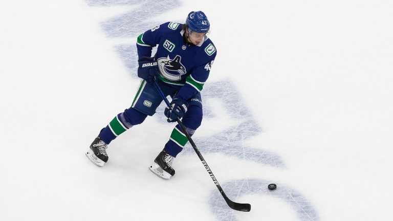 Vancouver Canucks' Quinn Hughes (43) warms up prior to NHL Stanley Cup qualifying round action against the Minnesota Wild in Edmonton, Tuesday, Aug. 4, 2020. (Codie McLachlan/CP) 
