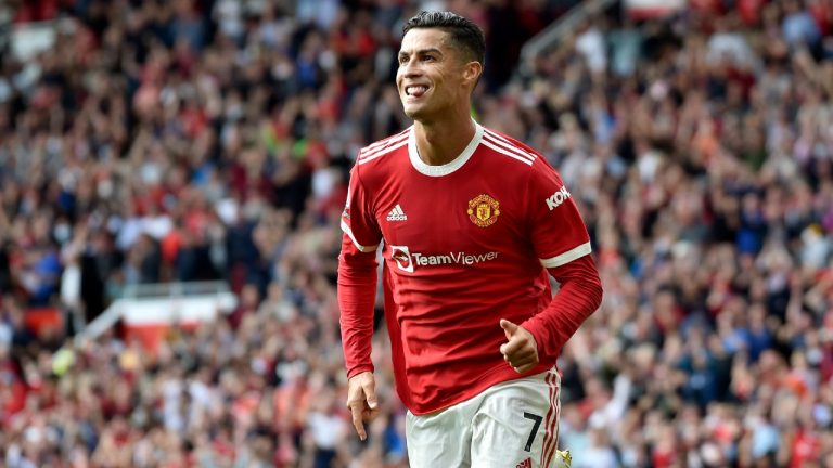 Manchester United's Cristiano Ronaldo celebrates after scoring the opening goal during the English Premier League soccer match between Manchester United and Newcastle United at Old Trafford stadium in Manchester, England, Saturday, Sept. 11, 2021. (Rui Vieira/AP)