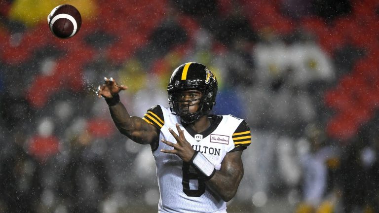 Hamilton Tiger-Cats quarterback David Watford (6) throws the ball against the Ottawa Redblacks during first half CFL football action in Ottawa on Wednesday, Sept. 22, 2021. (Justin Tang/CP)