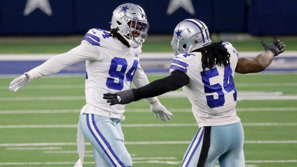 Elliott, Cowboys run over top defense, beat Panthers 36-28