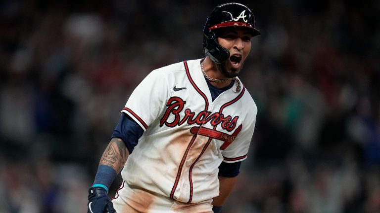 Atlanta Braves' Eddie Rosario celebrates after hitting a game winning RBI single during the ninth inning against the Los Angeles Dodgers in Game 2 of baseball's National League Championship Series Sunday, Oct. 17, 2021, in Atlanta. The Braves defeated the Dodgers 5-4 to lead the series 2-0 games. (Ashley Landis/AP)