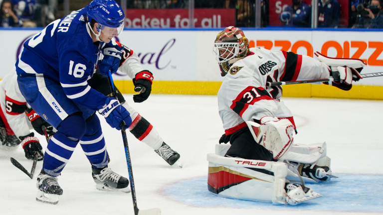 Toronto Maple Leafs forward Mitchell Marner (16) prepares to shoot on Ottawa Senators goaltender Anton Forsberg (31) during third period NHL action in Toronto on Saturday, October 16, 2021. (Evan Buhler/CP)