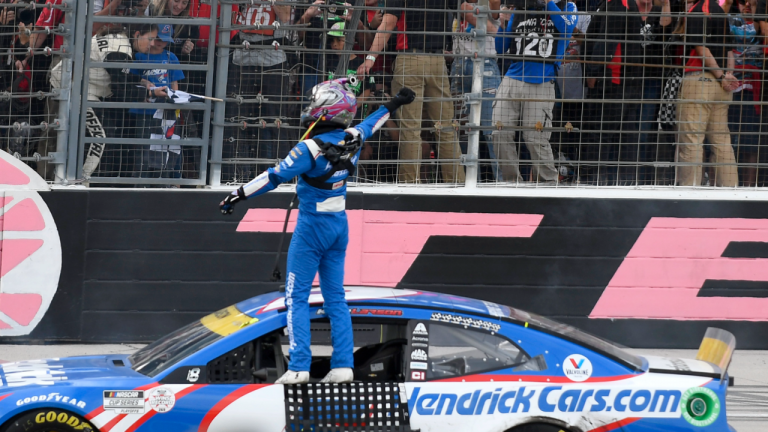 Kyle Larson paid tribute to lost teammates during this celebration on Sunday. (AP)