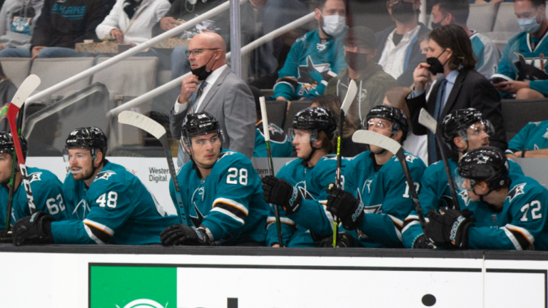 The San Jose Sharks were down seven players and one coach before Saturday's game against the Jets. (AP)