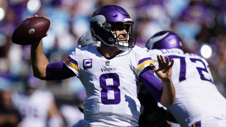 Minnesota Vikings quarterback Kirk Cousins (8) works in the p[ocket against the Carolina Panthers during the first half of an NFL football game, Sunday, Oct. 17, 2021, in Charlotte, N.C. (Jacob Kupferman/AP)