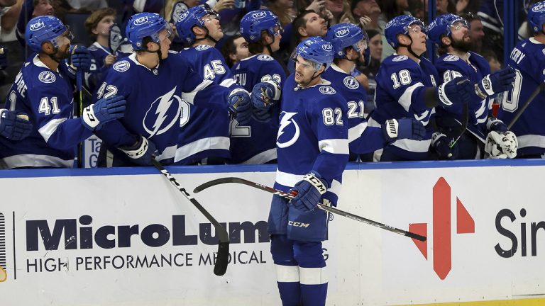 Tampa Bay Lightning's Gabriel Fortier celebrates his third goal of the game against the Carolina Hurricanes during the third period of a preseason NHL hockey game Friday, Oct. 1, 2021, in Tampa, Fla. (Mike Carlson/AP)