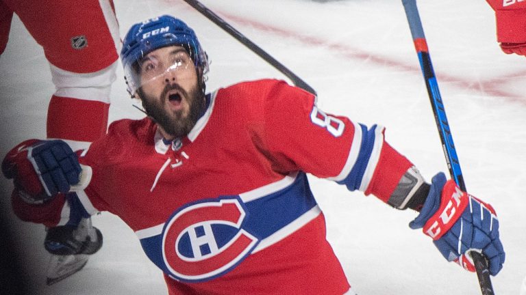 Montreal Canadiens' Mathieu Perreault reacts after scoring against the Detroit Red Wings during second period NHL hockey action in Montreal, Saturday, October 23, 2021. (Graham Hughes/The Canadian Press) 
