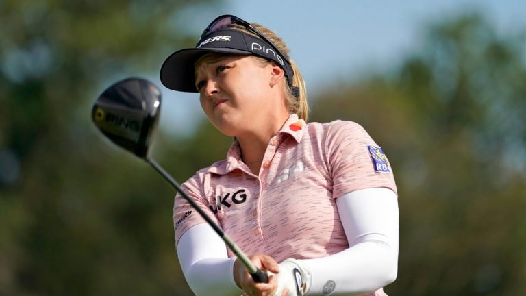 Brooke Henderson hits off the 11th tee in the second round of the Cognizant Founders Cup LPGA golf tournament, Friday, Oct. 8, 2021, in West Caldwell, N.J. (John Minchillo/AP Photo) 
