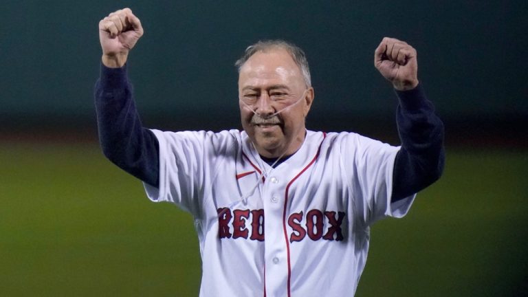 Former Boston Red Sox player Jerry Remy, who is battling lung cancer, throws a ceremonial first pitch before an American League Wild Card baseball game against the New York Yankees at Fenway Park, Tuesday, Oct. 5, 2021, in Boston (Charles Krupa/AP).