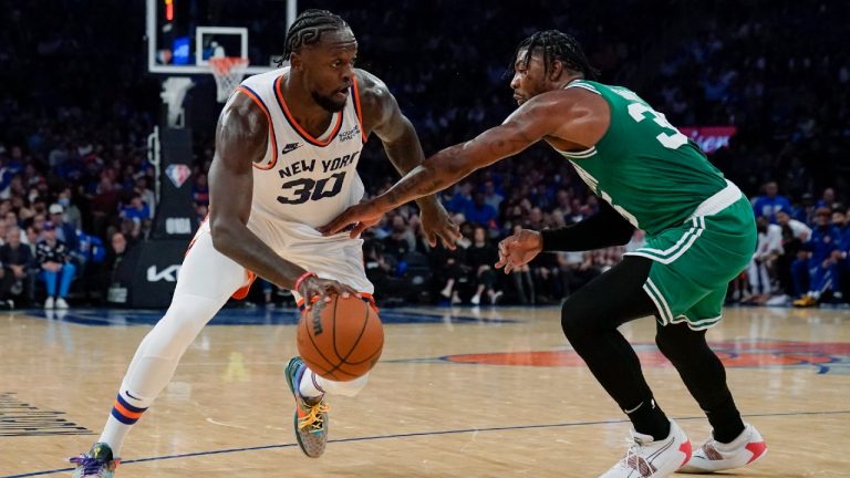 Boston Celtics' Marcus Smart (36) defends New York Knicks' Julius Randle (30) during the first half of an NBA basketball game Wednesday, Oct. 20, 2021, in New York (Frank Franklin II/AP).