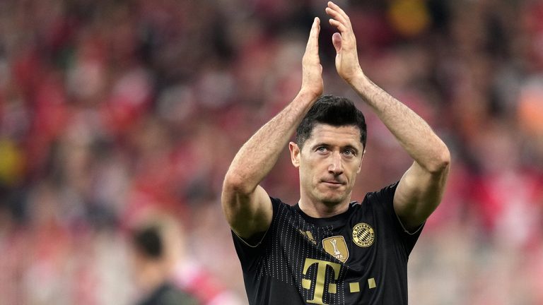 Bayern's Robert Lewandowski applauds at the end of the German Bundesliga soccer match between 1. FC Union Berlin and FC Bayern Munich in Berlin, Germany. (Michael Sohn/AP)