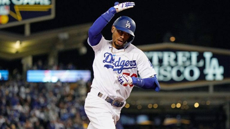 Los Angeles Dodgers' Mookie Betts celebrates as he runs the bases on a two-run home run during the fourth inning against the San Francisco Giants in Game 4 of a baseball National League Division Series, Tuesday, Oct. 12, 2021, in Los Angeles. (Marcio Jose Sanchez/AP)