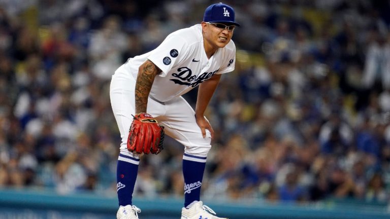 Los Angeles Dodgers starting pitcher Julio Urias reacts after Atlanta Braves' Austin Riley broke up his perfect baseball game bid with an infield single during the fifth inning Monday, Aug. 30, 2021, in Los Angeles. (Marcio Jose Sanchez/AP)