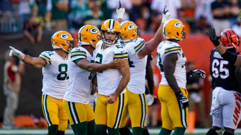 Green Bay Packers kicker Mason Crosby (2) celebrates after a winning field goal during overtime in an NFL football game against the Cincinnati Bengals in Cincinnati, Sunday, Oct. 10, 2021. The Packers defeated the Bengals 25-22 in overtime (Bryan Woolston/AP).