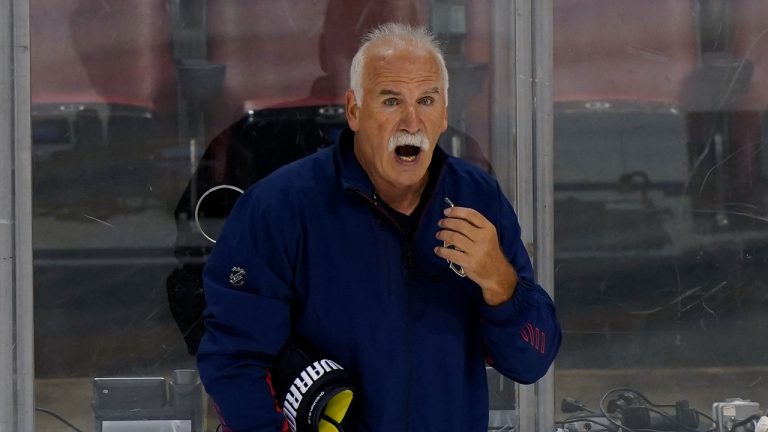 Florida Panthers head coach Joel Quenneville calls out to players during an NHL hockey training camp, Friday, Sept. 24, 2021, in Sunrise, Fla. (Wilfredo Lee/AP Photo) 
