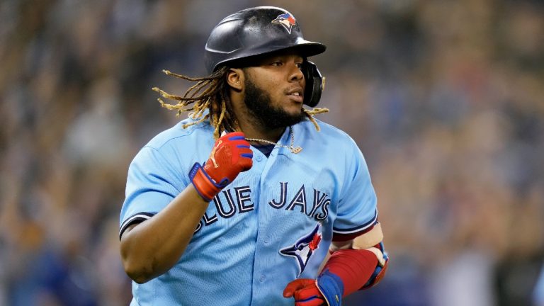 Toronto Blue Jays designated hitter Vladimir Guerrero Jr. (27) rounds the bases after hitting a two run home run during second inning MLB American League baseball action against the Baltimore Orioles, in Toronto, Sunday, Oct. 3, 2021. (Frank Gunn/CP)