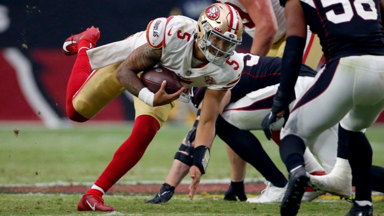 San Francisco 49ers quarterback Trey Lance (5) scrambles against the Arizona Cardinals during the second half of an NFL football game, Sunday, Oct. 10, 2021, in Glendale, Ariz. (Ralph Freso/AP)