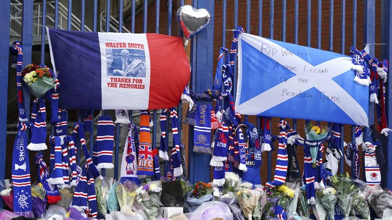 Tributes are laid at Ibrox Stadium in memory of former Scotland, Rangers and Everton manager Walter Smith, in Glasgow, Scotland, Tuesday, Oct. 26, 2021. (Andrew Milligan/PA via AP)