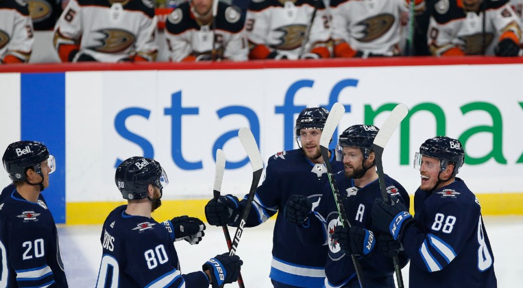 Connor scores twice, powers undermanned Winnipeg Jets to win over