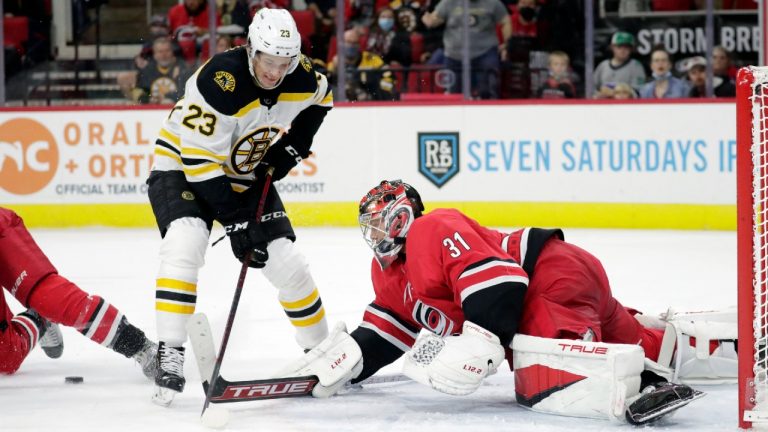 Carolina Hurricanes goaltender Frederik Andersen (31) stops Boston Bruins centre Jack Studnicka (23) during the third period of an NHL hockey game Thursday, Oct. 28, 2021, in Raleigh, N.C. (Chris Seward/AP)