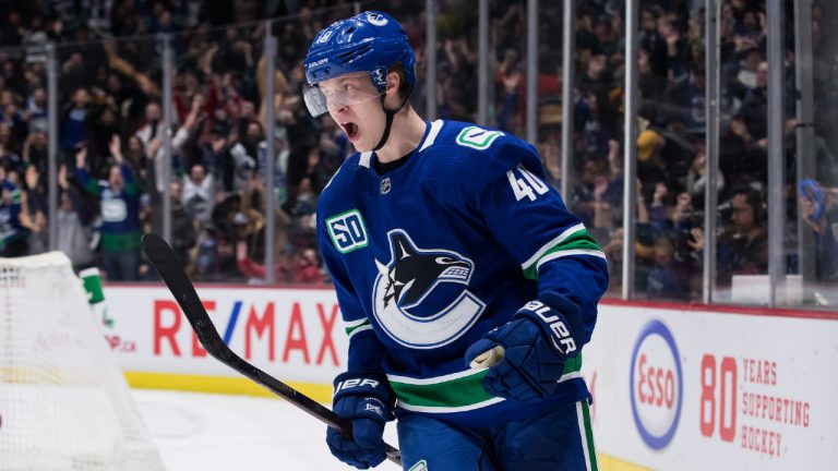 Vancouver Canucks' Elias Pettersson, of Sweden, celebrates after scoring the winning goal against the Carolina Hurricanes during overtime NHL hockey action in Vancouver, on Thursday December 12, 2019. (Darryl Dyck/CP) 