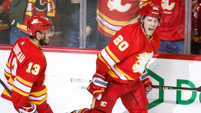 Calgary Flames' Blake Coleman, right, celebrates his goal with teammate Johnny Gaudreau during first period NHL hockey action. (Jeff McIntosh/CP) 