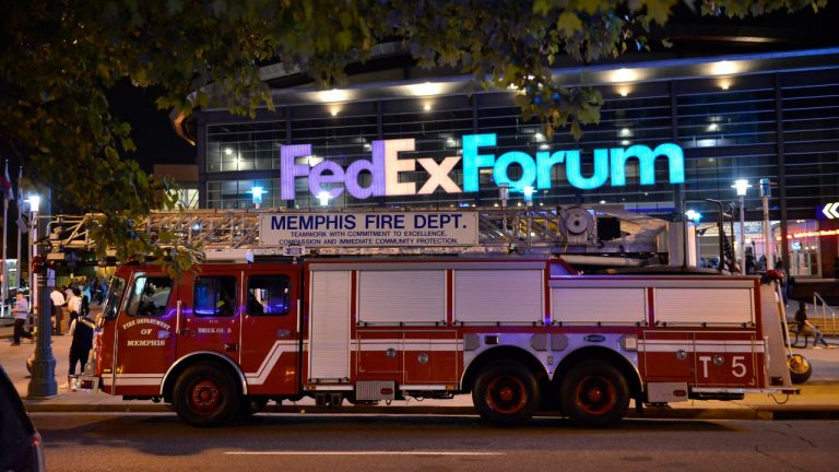 A fire truck is parked outside FedExForum after a fire alarm went off during an NBA preseason basketball game between the Milwaukee Bucks and the Memphis Grizzlies Tuesday, Oct. 5, 2021, in Memphis, Tenn. (Brandon Dill/AP Photo) 
