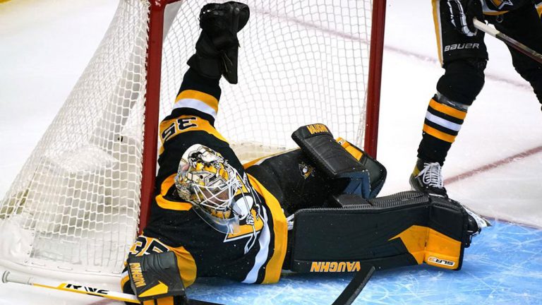 Pittsburgh Penguins goaltender Tristan Jarry sprawls across the goal crease during the first period of a preseason NHL hockey game against the Detroit Red Wings. (Gene J. Puskar/AP)