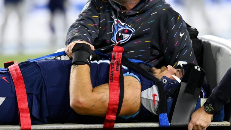 Tennessee Titans offensive tackle Taylor Lewan is taken off the field after being injured in the first half of an NFL football game against the Buffalo Bills Monday, Oct. 18, 2021, in Nashville, Tenn. (Mark Zaleski/AP Photo) 
