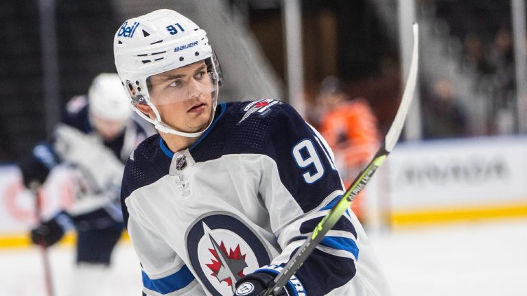 Winnipeg Jets' Cole Perfetti (91) warms up before taking on the Edmonton Oilers during NHL preseason action in Edmonton on Saturday, October 2, 2021. (Jason Franson/CP)