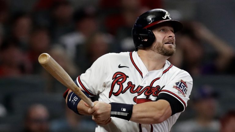 Atlanta Braves' Stephen Vogt watches his home run off Washington Nationals pitcher Erick Fedde during the fifth inning of a baseball game Thursday, Sept. 9, 2021, in Atlanta. (Ben Margot/AP)