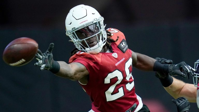 Arizona Cardinals running back Jonathan Ward (29) is unable to make a catch as Cardinals linebacker Tanner Vallejo (51) defends during an NFL football training camp practice, Wednesday, Aug. 4, 2021, in Glendale, Ariz. (Ross D. Franklin/AP)