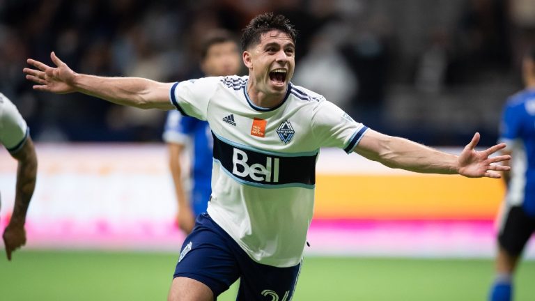 Vancouver Whitecaps' Brian White celebrates his third goal against the San Jose Earthquakes during the second half of an MLS soccer game in Vancouver, on Saturday, October 2, 2021. (Darryl Dyck/CP)