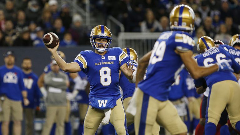 Winnipeg Blue Bombers quarterback Zach Collaros (8) throws during the first half of CFL action against the Montreal Alouettes in Winnipeg.  (John Woods/CP)